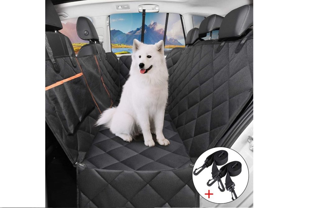 funda coche perros OMORC Imagen de un perro en los asientos traseros de un coche