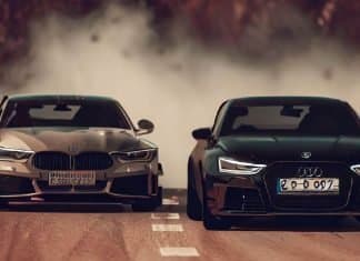 ¿Tienen en cuenta la ciberseguridad Audi y BMW en sus informes anuales? Imagen de un duelo entre un Audi y un BMW